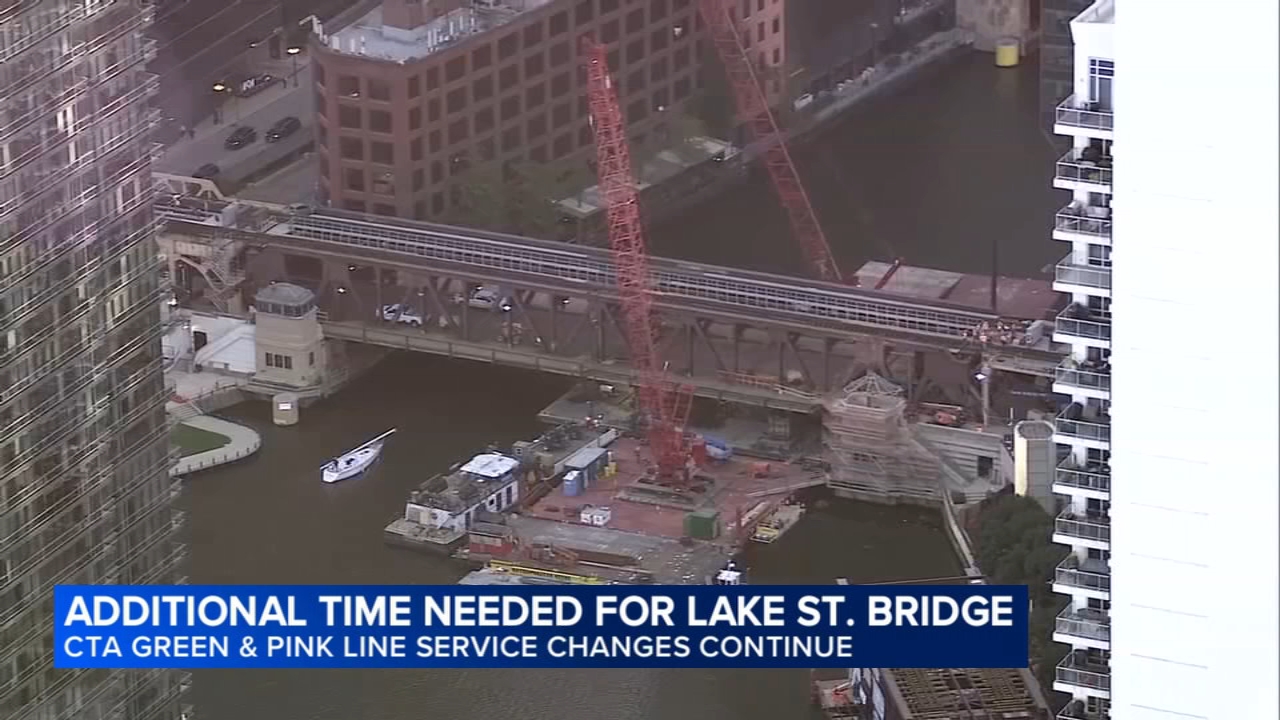 Lake Street Bridge under construction with CTA Green Line train passing nearby